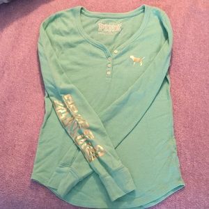 Pink long sleeve shirt.